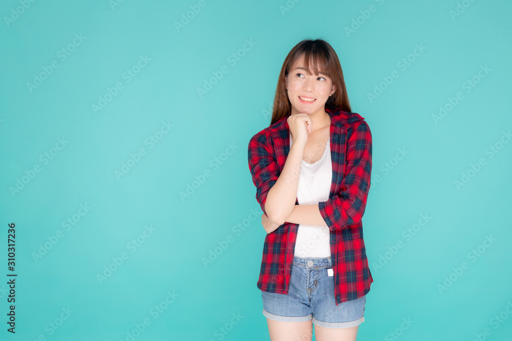 Beautiful portrait young asian woman wear clothes fashion travel thinking idea and enjoy summer holiday isolated blue background, girl smiling confident and cheerful, travel in vacation concept. Beautiful portrait young asian woman wear clothes fashion travel thinking idea and enjoy summer holiday isolated blue background, girl smiling confident and cheerful, travel in vacation concept.