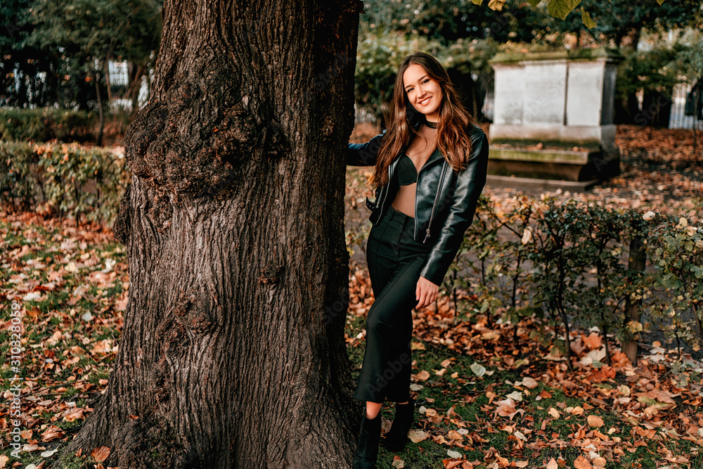 Portrait of Young Brunette Girl with Long Hair, Fashion Street Style Portrait of Young Brunette Girl with Long Hair, Fashion Street Style