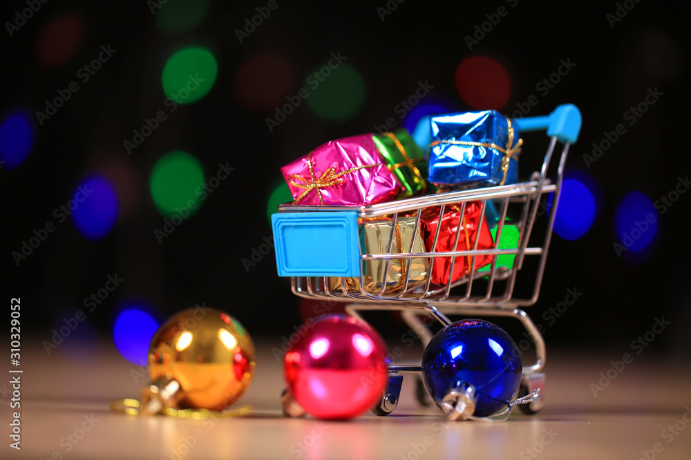 Christmas presents are in the shopping cart