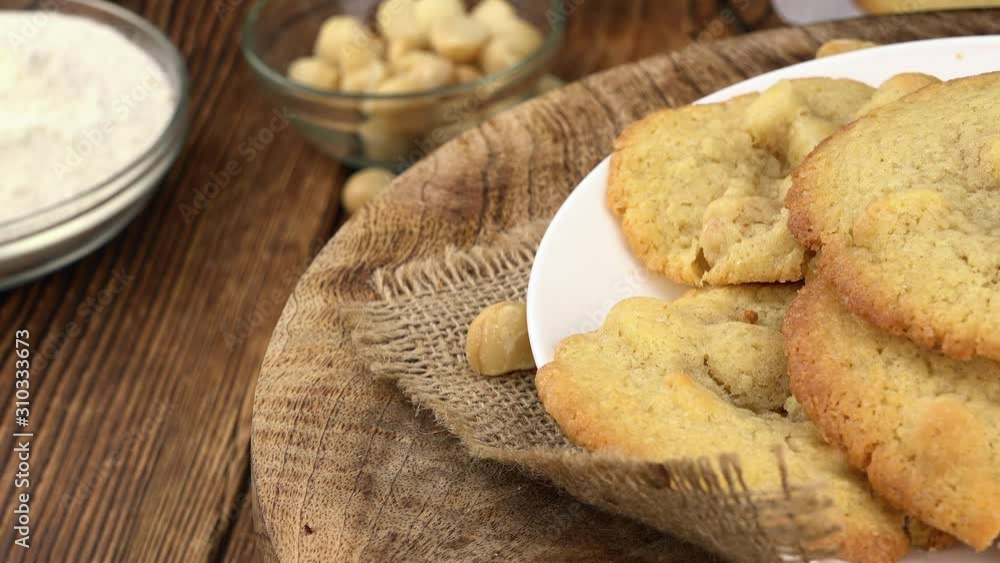 Fresh homemade cookies on a rotating plate as seamless loopable 4K footage Fresh homemade cookies on a rotating plate as seamless loopable 4K footage