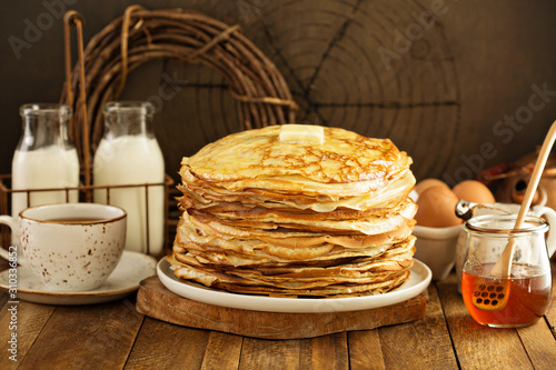Konstfotografi Stack of thin russian pancakes or crepes made for shrove Tuesday or Maslenitza,