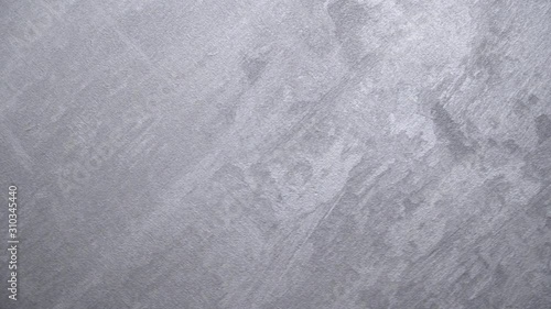 background of the plastered texture with marble effect grey. artistic background handmade. Venetian plaster. circular background rotation