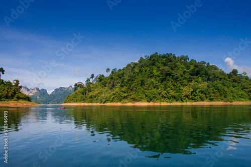 limestone Mountain and morning mist and beautiful view neture in the Cheow Lan dam Khao Sok National Park, Thailand