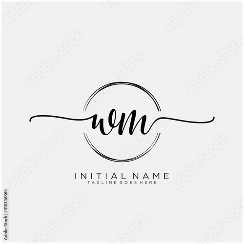 Obraz na płótnie WM Initial handwriting logo with circle template vector.