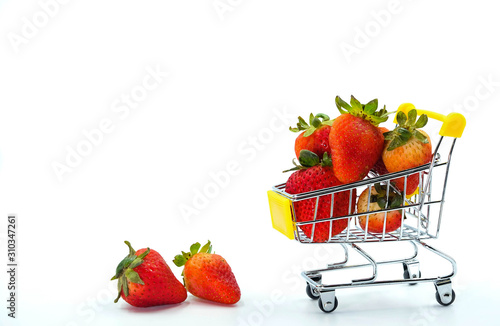 Close up strawberry on shopping cart isolatd on White Background