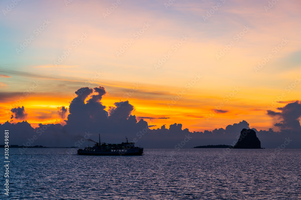 SIlhouette unidentified ferry ship running sea SIlhouette unidentified ferry ship running sea