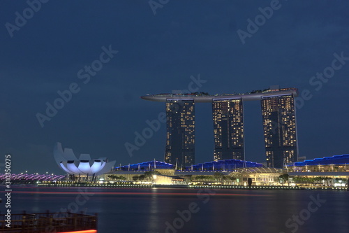 Singapore - November 22, 2019 : Singapore cityscape at dusk. Landscape of Singapore business building around Marina bay. Modern high building in business district area at twilight.