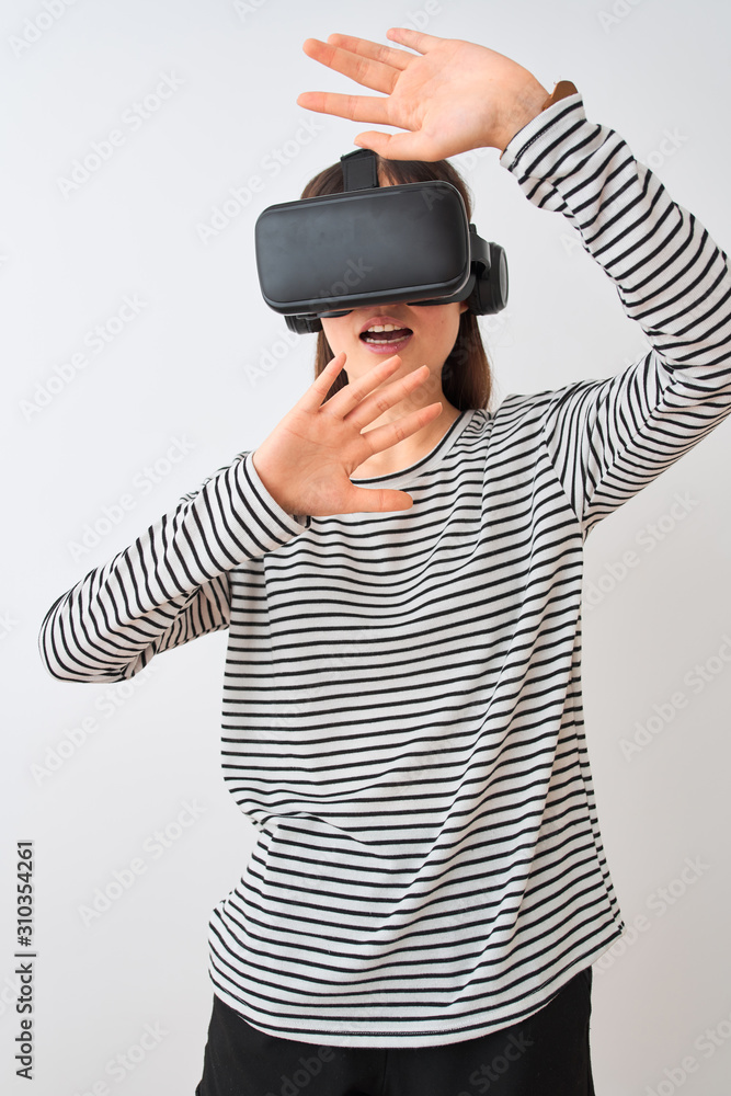 Young beautiful chinese woman playing virtual reality game using goggles Young beautiful chinese woman playing virtual reality game using goggles