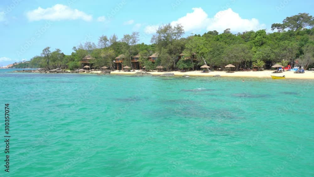 Bungalow at Beach in Rain Forest on Sunny Day Bungalow at Beach in Rain Forest on Sunny Day