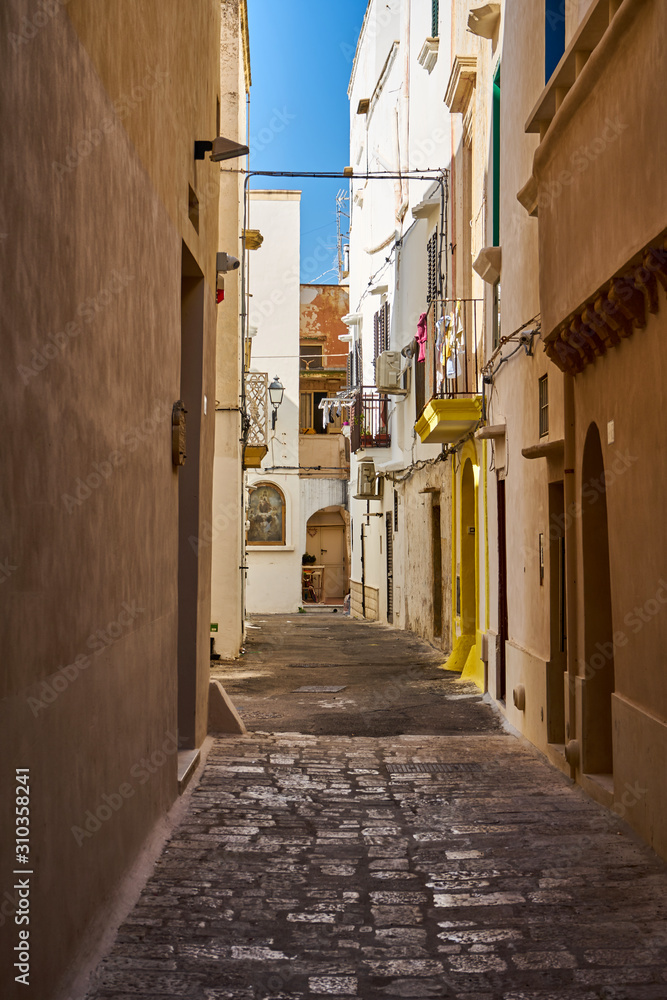 Typical Streets Of Old City Gallipoli In Puglia Italy During a Bright Sunny Day