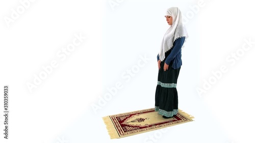 Worshiper Muslim Woman Kneeling and Prostrating in Namaz, White Background photo