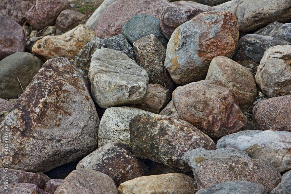Dry textured stone gravel closeup on beach, natural backdrop