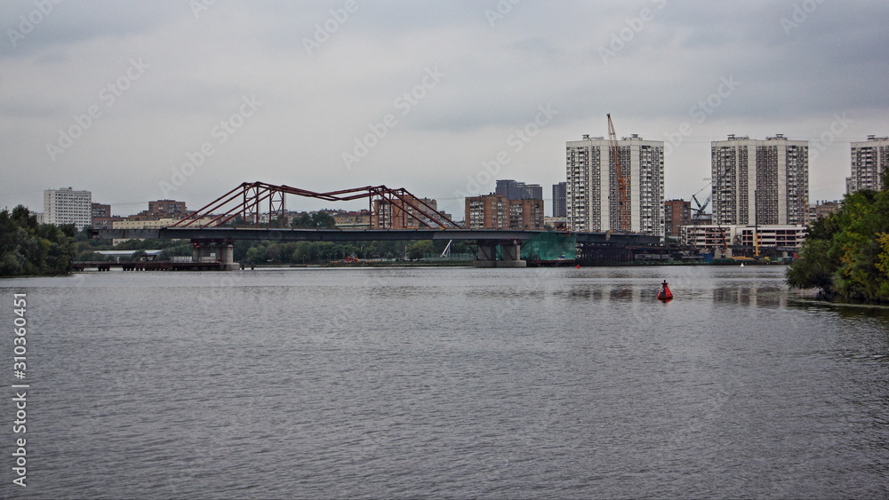 Modern bridge on Moscow river on houses background, Nagatino district city landscape