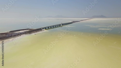 Long highway on the white Urmia salt lake in Iran photo