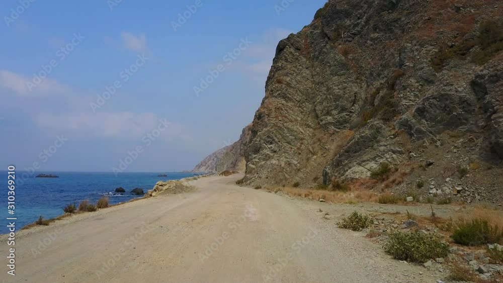 Flying on gravelly coastal road that mediterranean side of Turkey Flying on gravelly coastal road that mediterranean side of Turkey
