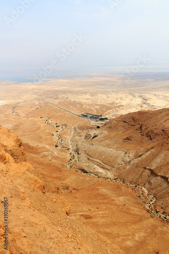 Judaean Desert panorama with wadis and salt lake dead sea seen from Masada fortress  Israel