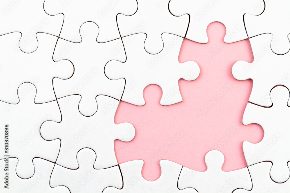 White puzzle over pink backround with missing pieces. Incomplete elements, solution search concept White puzzle over pink backround with missing pieces. Incomplete elements, solution search concept