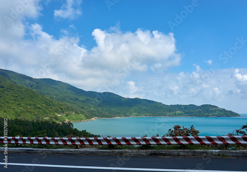 DA NANG, VIETNAM - NOVEMBER 20, 2019: Street at Son Tra Mountain with view over Da nang city, Vietnam photo