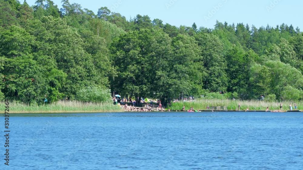 people swimming scandinavian waters near stockholm, sweeden, 4k people swimming scandinavian waters near stockholm, sweeden, 4k