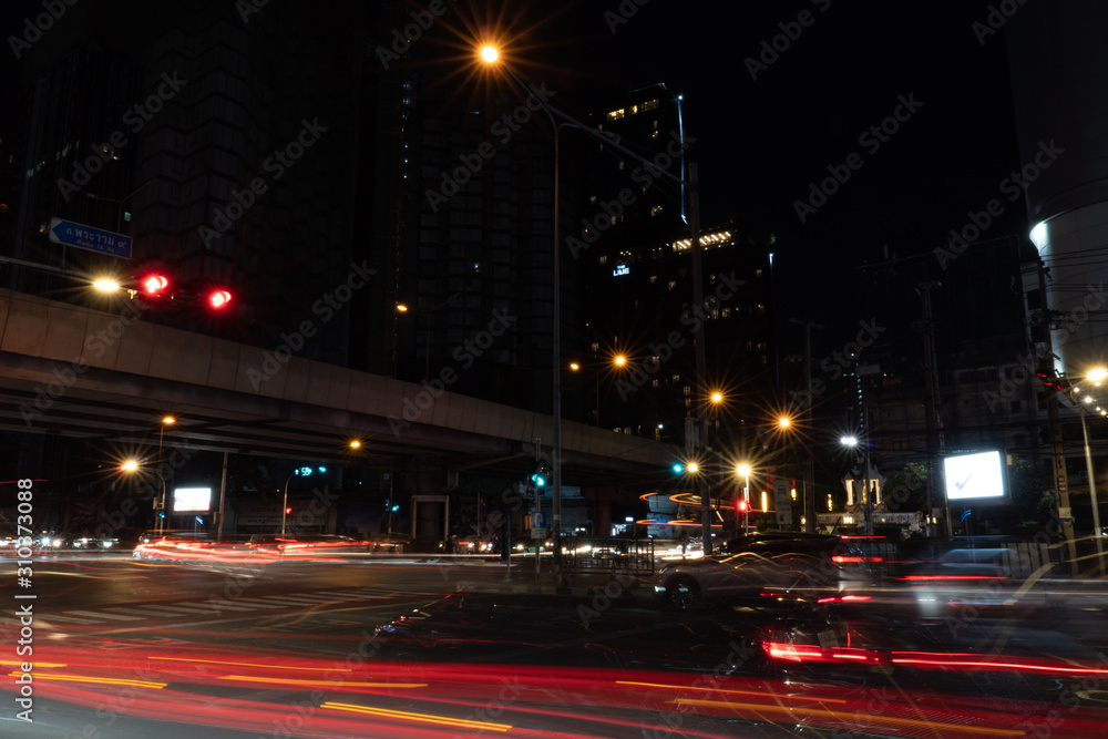 Cityscape Traffic night at Rama 9 cross-junction in bangkok city
