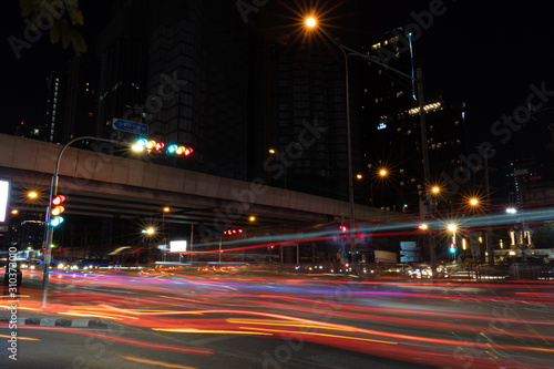 Cityscape Traffic night at Rama 9 cross-junction in bangkok city