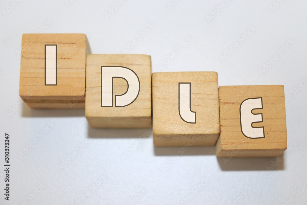 IDLE word made with building blocks isolated on white IDLE word made with building blocks isolated on white