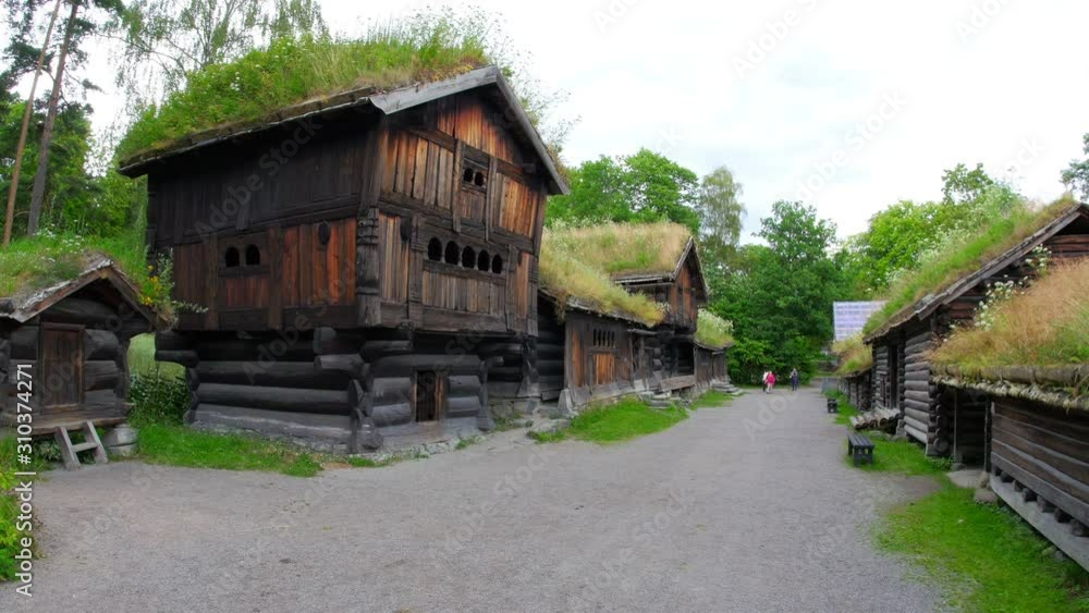 people at norwagian village houses with green grass rooftop, norway, 4k people at norwagian village houses with green grass rooftop, norway, 4k
