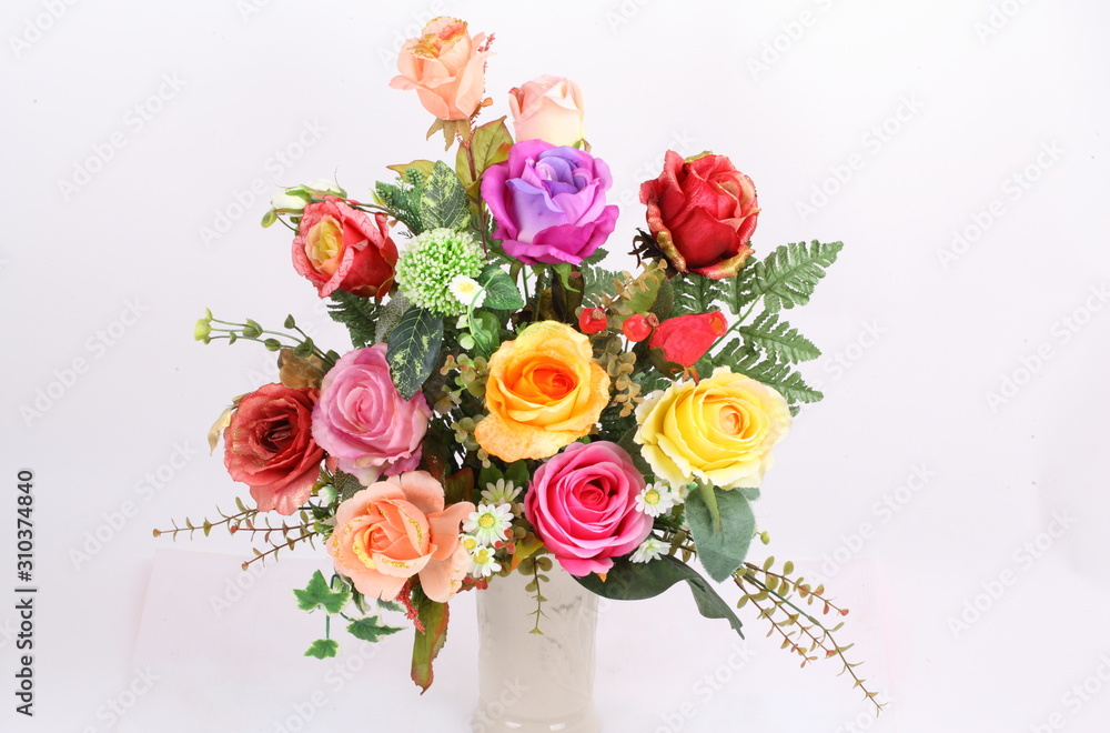 Obraz premium Decorative artificial flowers on white background