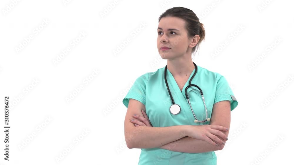 Happy beautiful Caucasian woman doctor wearing stethoscope thinking and looking up Happy beautiful Caucasian woman doctor wearing stethoscope thinking and looking up