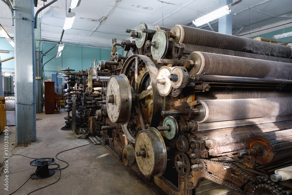 Old looms in an abandoned textile factory Old looms in an abandoned textile factory