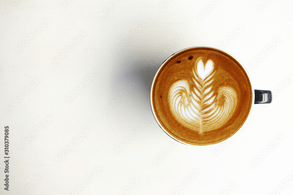 a cup of latte art coffee isolated on white background a cup of latte art coffee isolated on white background