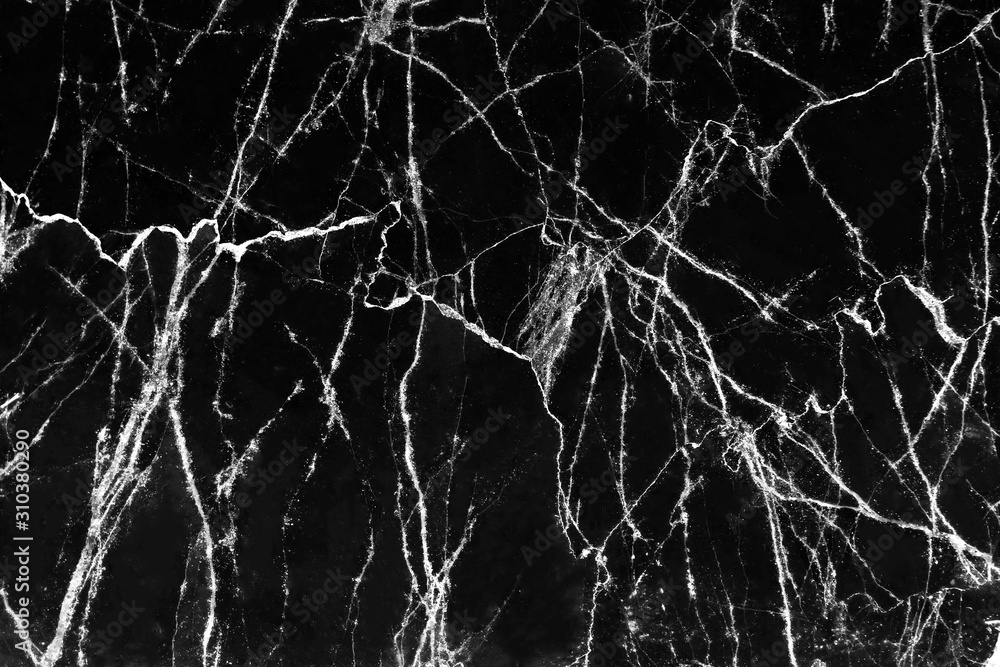 Marble black surface white cracked veins patterns abstract nature background