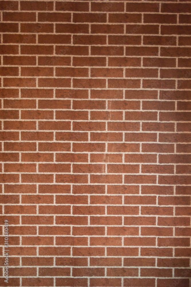 brown brick wallpaper in room . brown brick wallpaper in room .