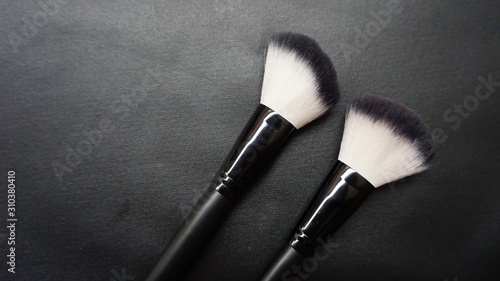 black background makeup brush