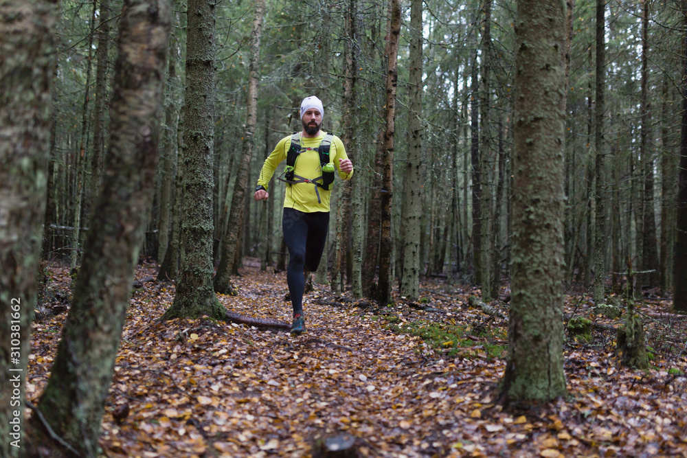 Man running in forest