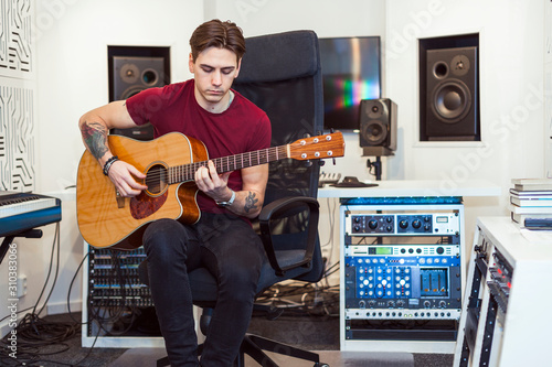 Young man playing guitar