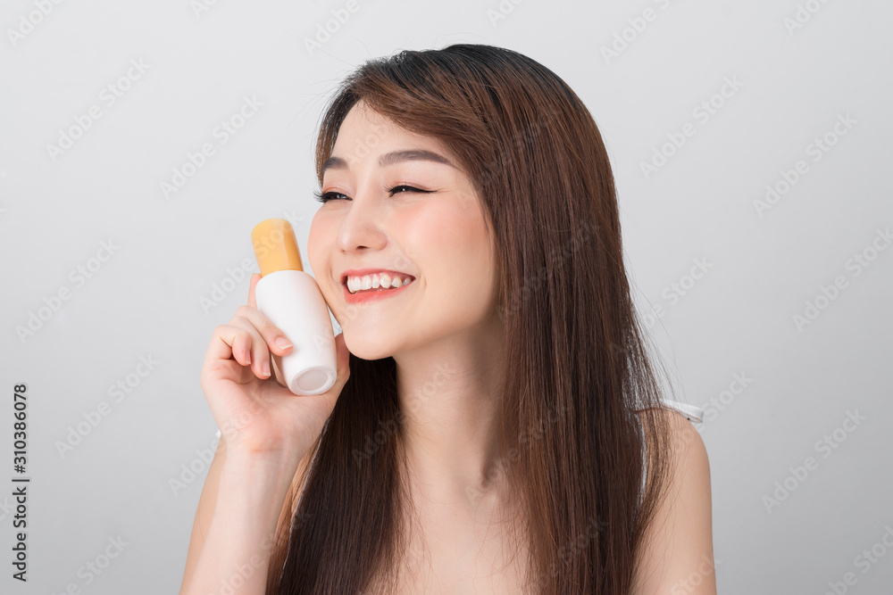 Young Asian woman in beauty concept isolated on white background Young Asian woman in beauty concept isolated on white background