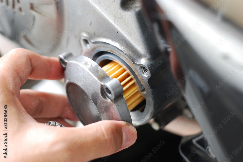 Fototapeta premium New Engine oil filter change