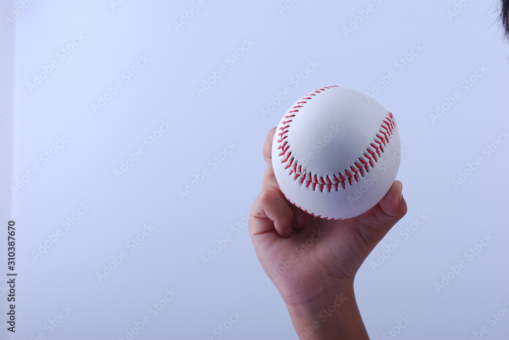 hand hold a professional baseball isolated on white hand hold a professional baseball isolated on white