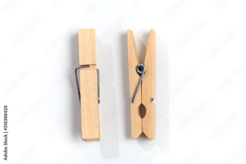 Brown wood clothes peg or clothespin on white background. - Image Brown wood clothes peg or clothespin on white background. - Image