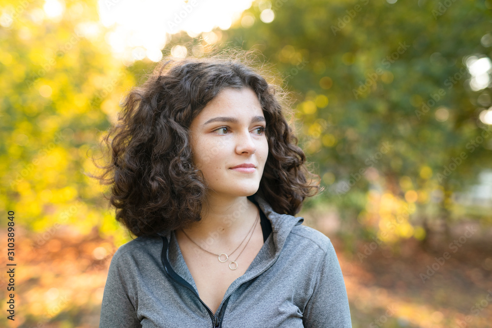 Portrait of young woman in park Portrait of young woman in park
