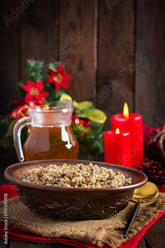 Kutya. Christmas porridge made of wheat grains, poppy seed, nuts, raisins and honey. Christmas kutia. Ukrainian cuisine.