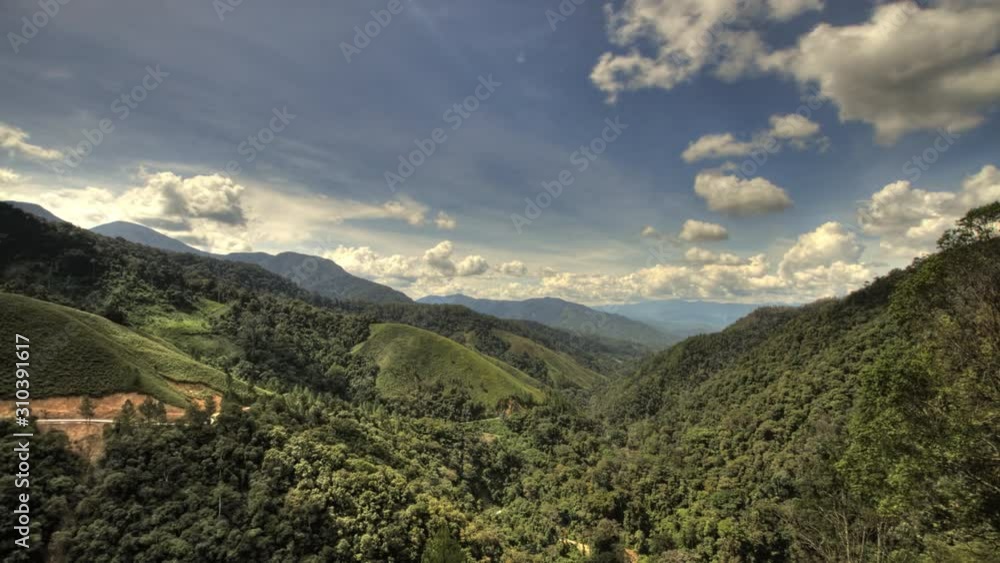 Jungle Valley Mountain Pass Timelapse with Clouds and Shadows Jungle Valley Mountain Pass Timelapse with Clouds and Shadows