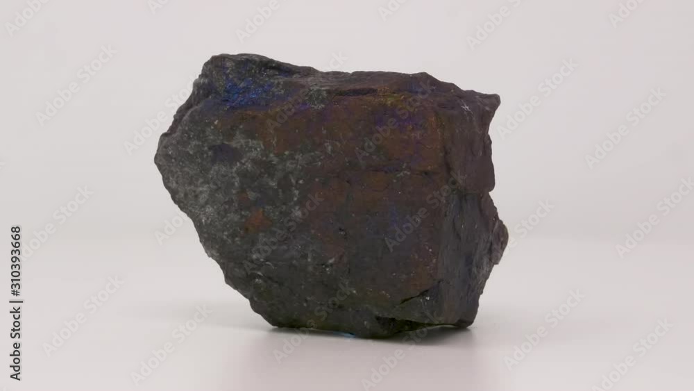 Very close view of Bornite. Peacock ore specimen. Rotating front to back. Very close view of Bornite. Peacock ore specimen. Rotating front to back.