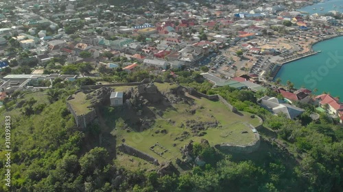 Eighteenth century Fort St Louis with the Capital of Saint Martin, Marigot in the background which is an amazing port city in the Caribbean photo