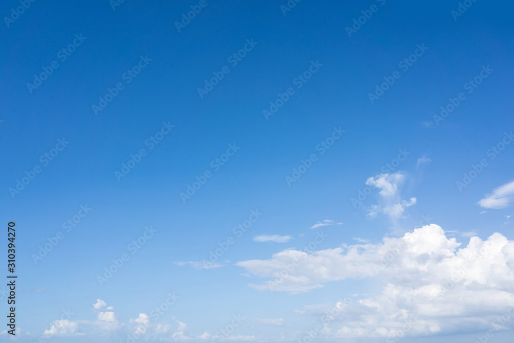 Blue sky and white puffy clouds Blue sky and white puffy clouds