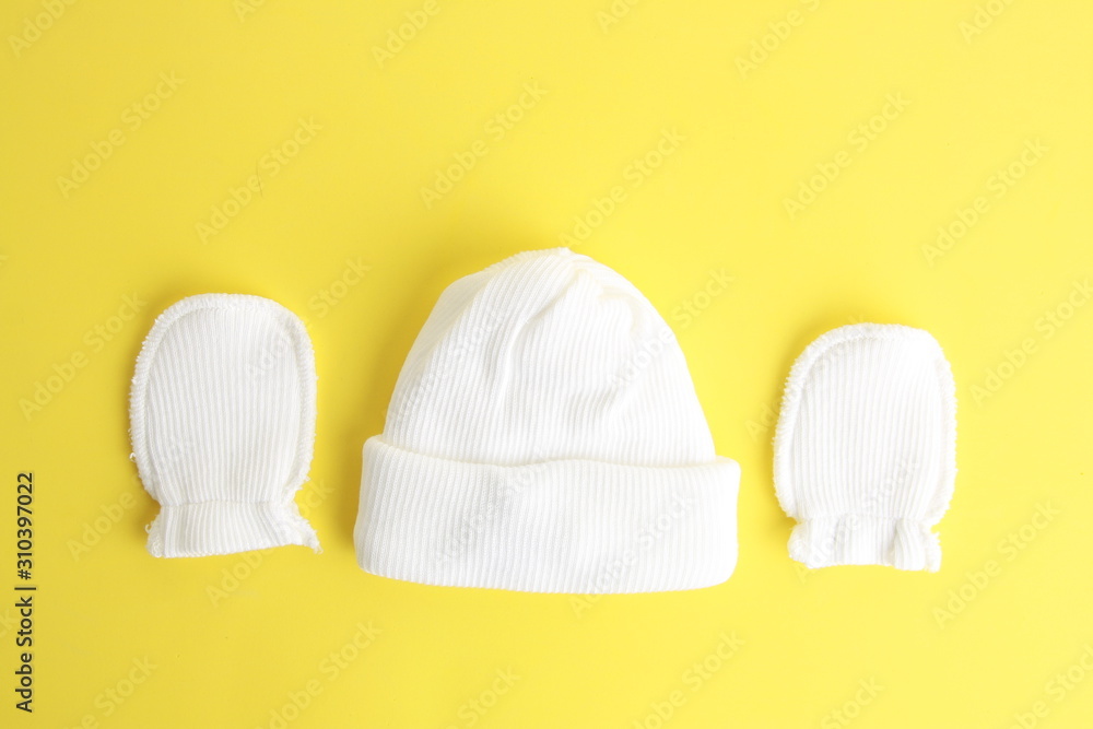 white wool hat and mittens for baby