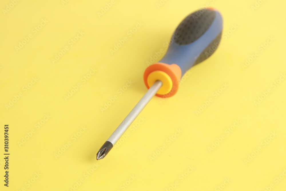 screwdriver tipped star, orange blue and black screwdriver tipped star, orange blue and black
