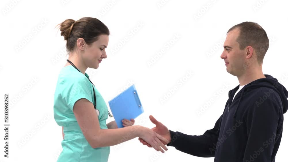 Close-up of young therapist checking radial pulse on her male patient wrist. Professional doctor performing medical check-up. Healthcare concept Close-up of young therapist checking radial pulse on her male patient wrist. Professional doctor performing medical check-up. Healthcare concept