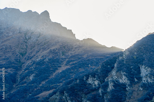 High snowy mountains and glacier in North Ossetia in the fall.